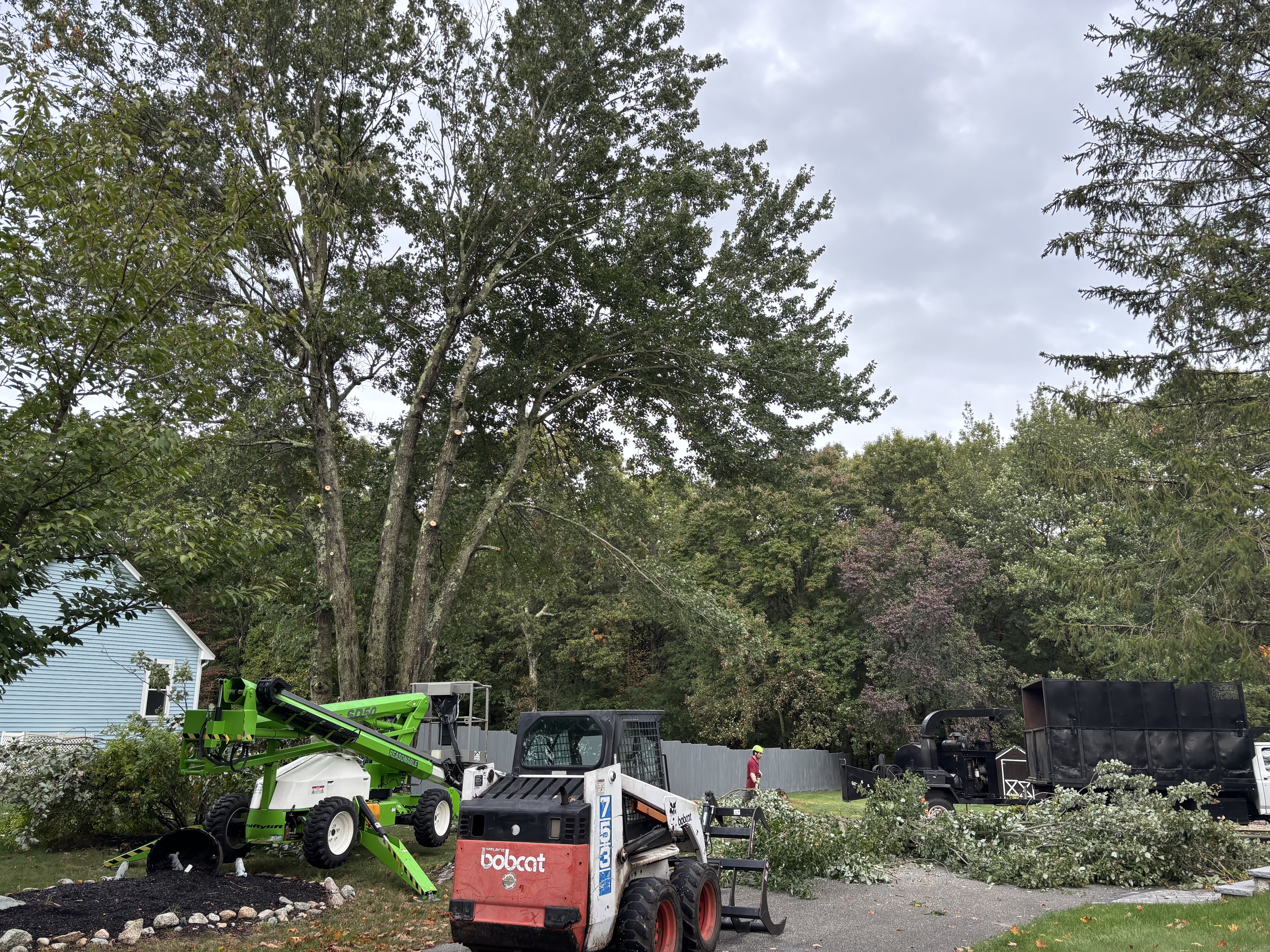 Skidsteer and backhoe work